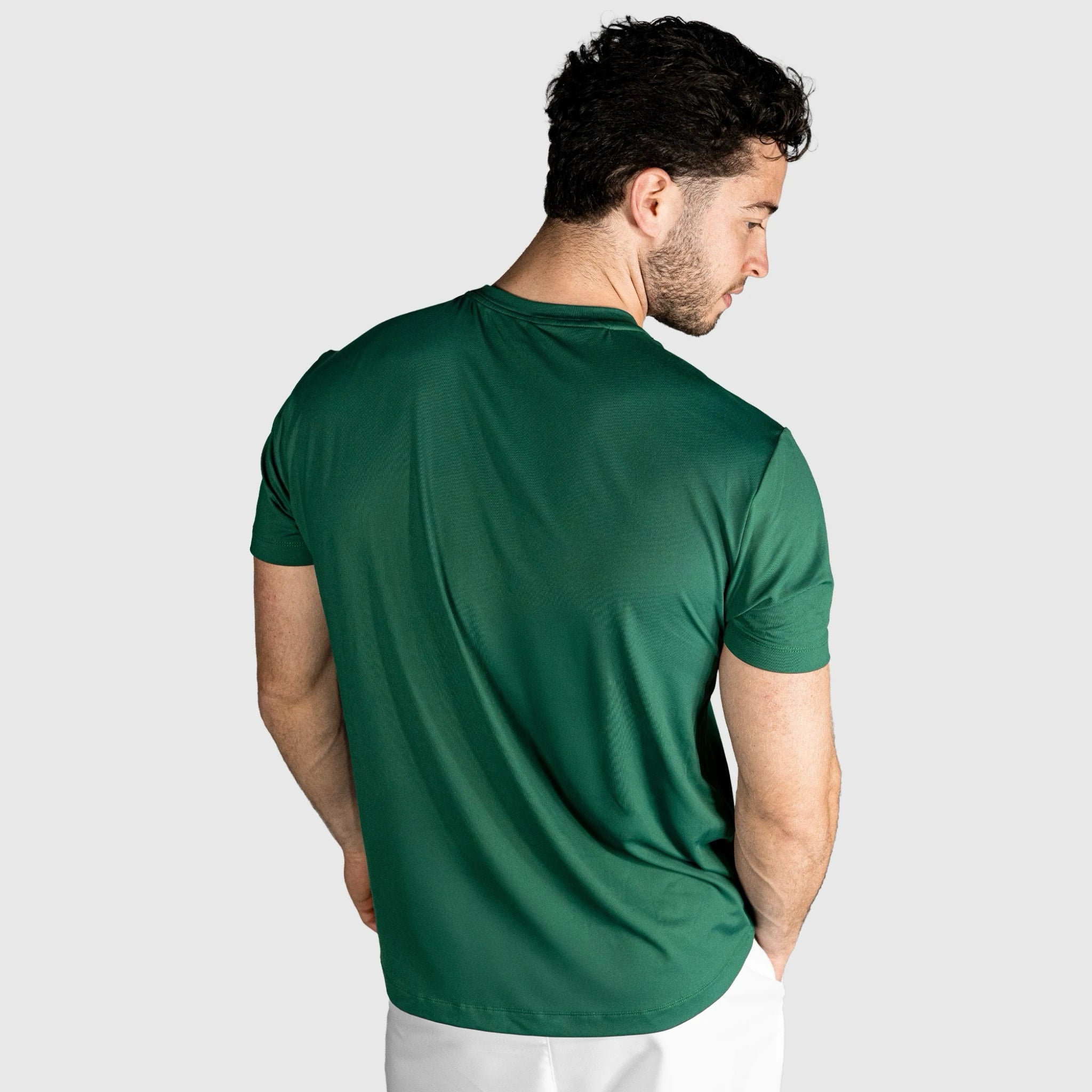 Man wearing a Impact Padel T-shirt-green on a plain background