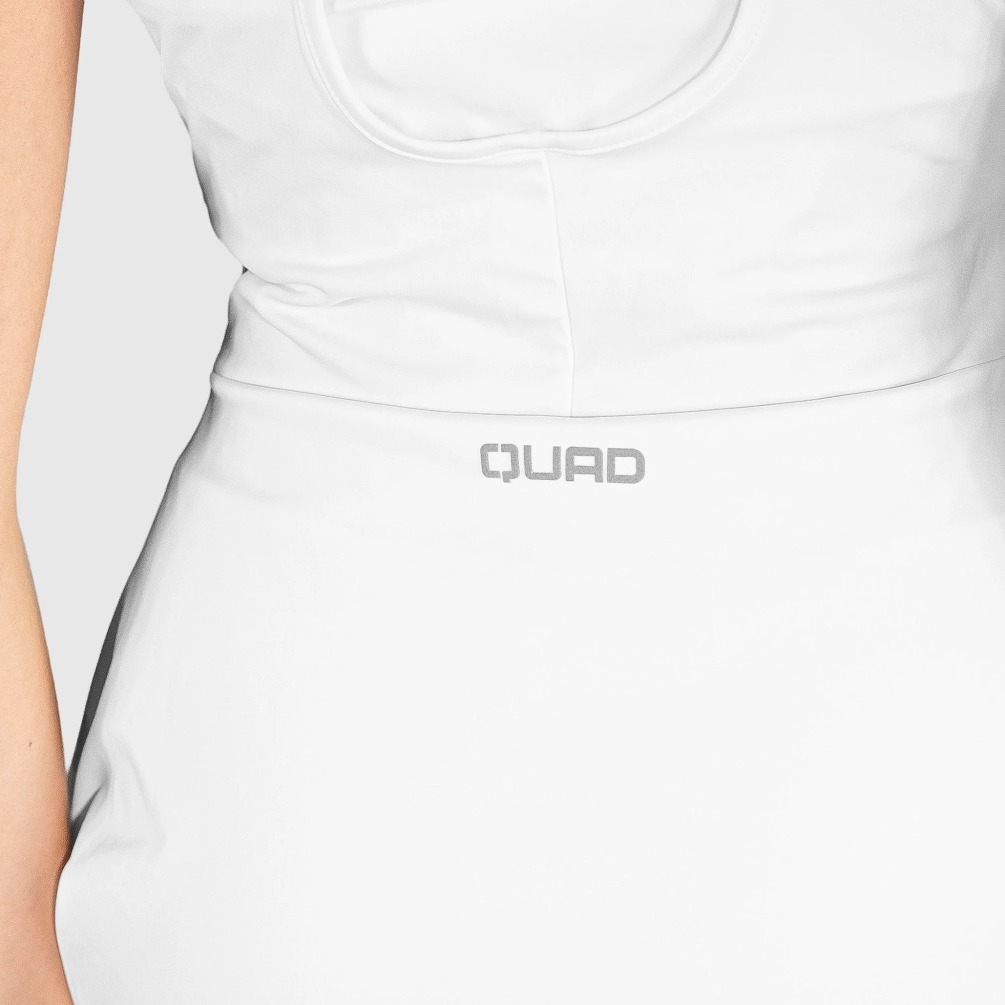 QUAD Twist Padel Dress with 'QUAD' branding on a plain background