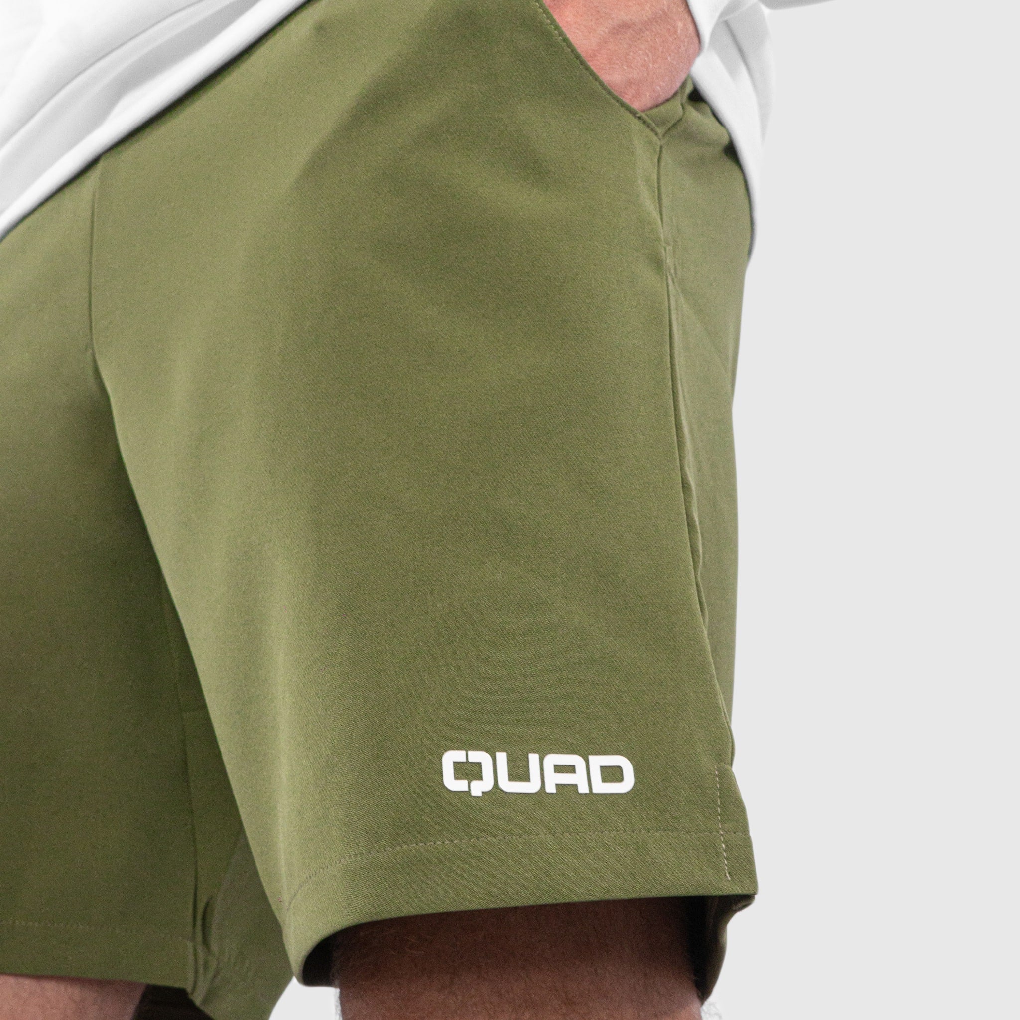 Quad Padel Shorts green logo detail