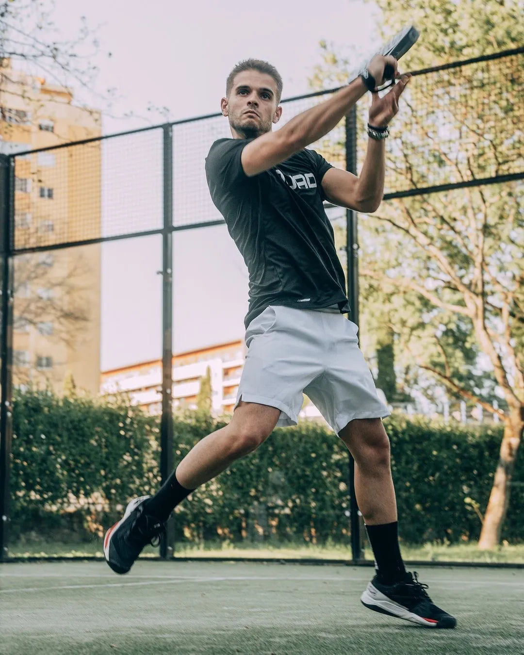 Quad Brand - Men playing Padel