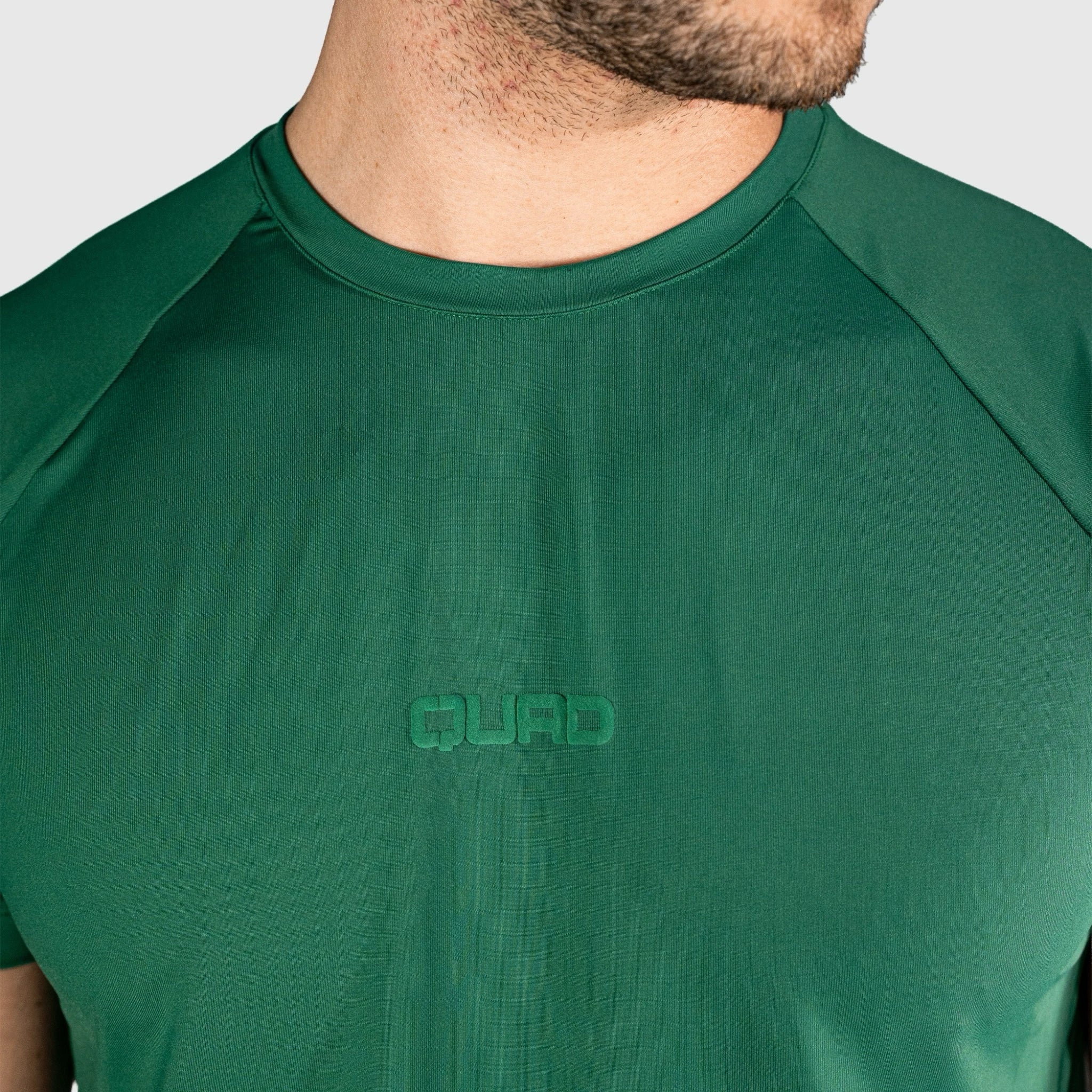 QUAD Ace Padel green T-shirt with 'QUAD' logo on a plain background