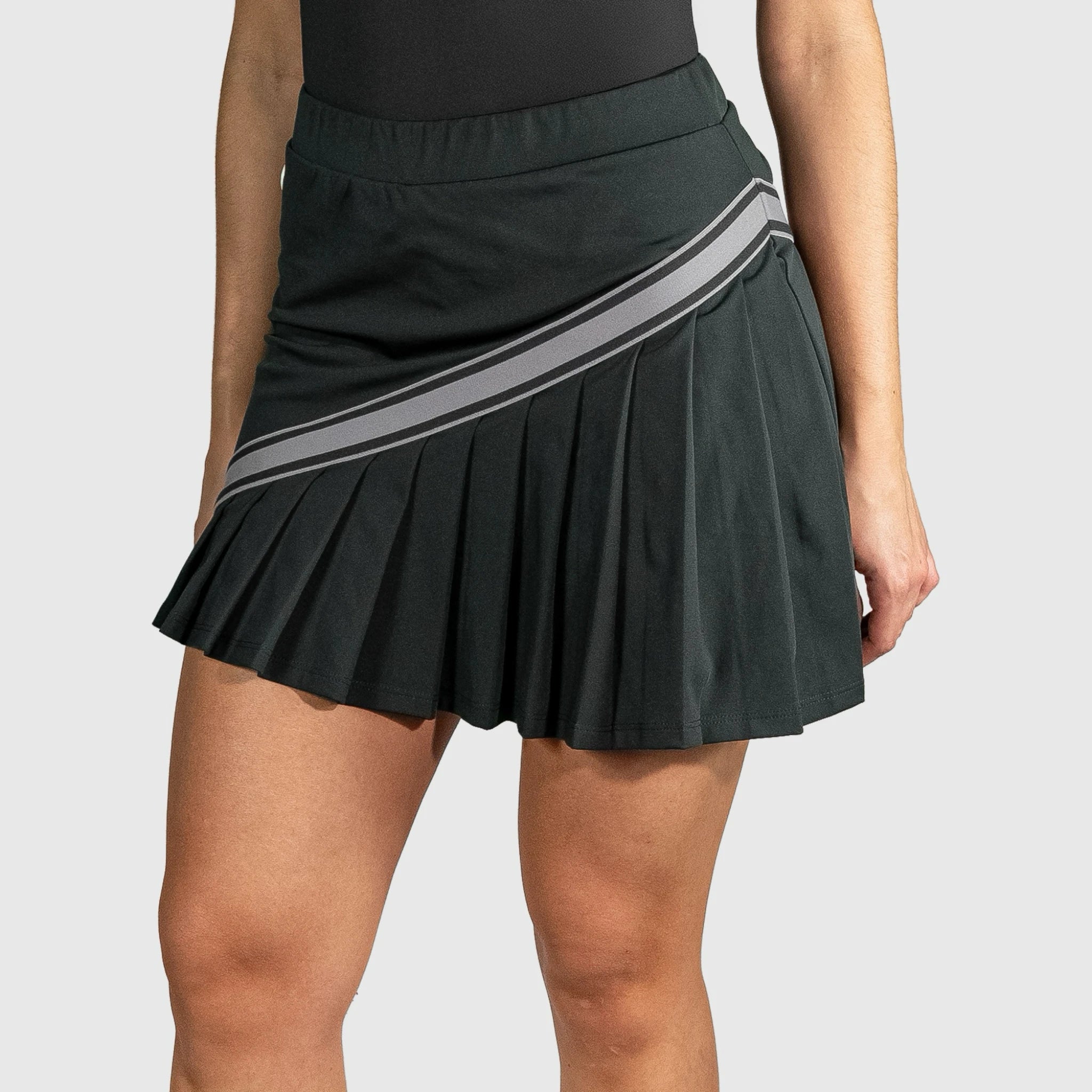 QUAD Halo Padel Skirt with gray stripes on a plain background