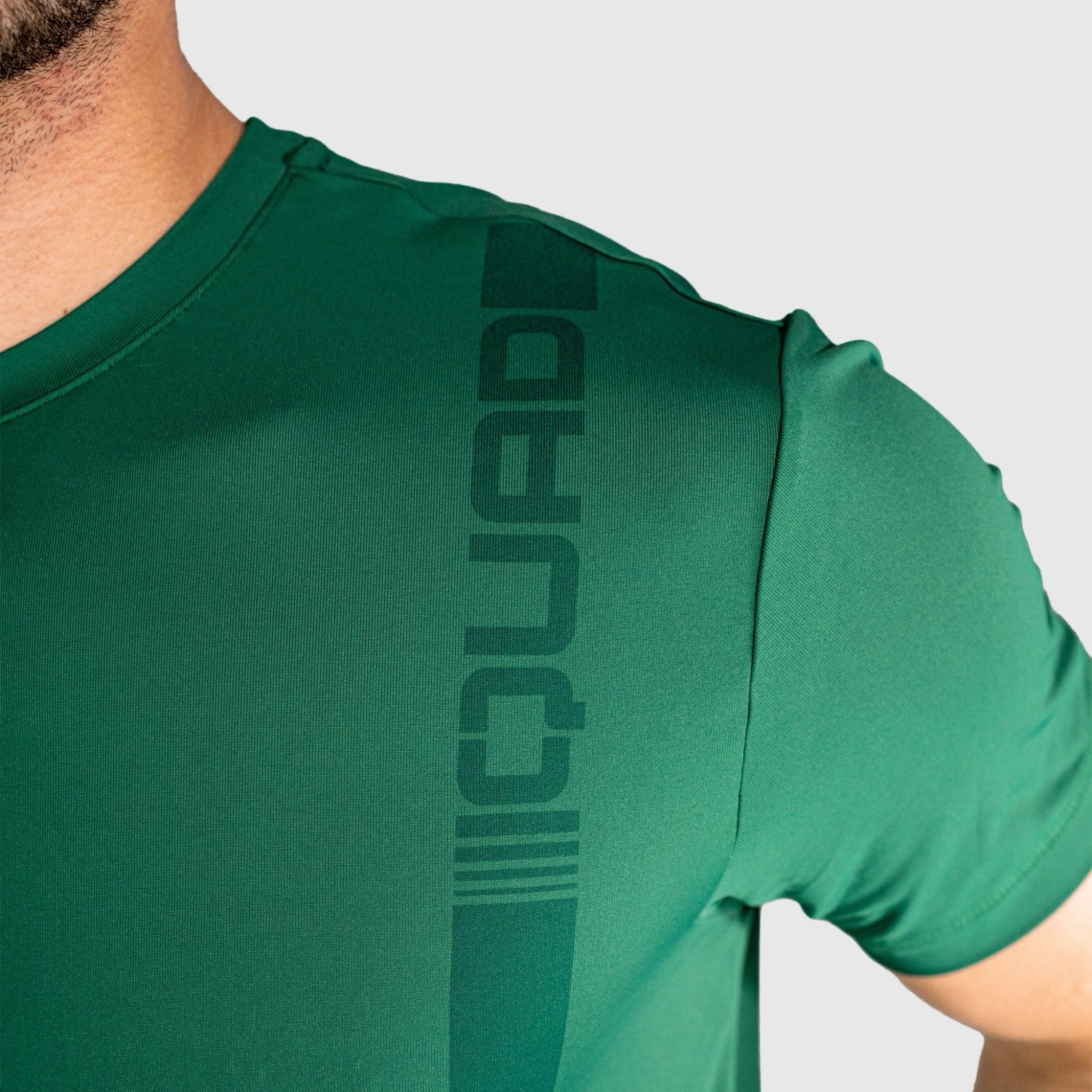 Impact Padel T-shirt-green with 'Guard' logo on a grey background
