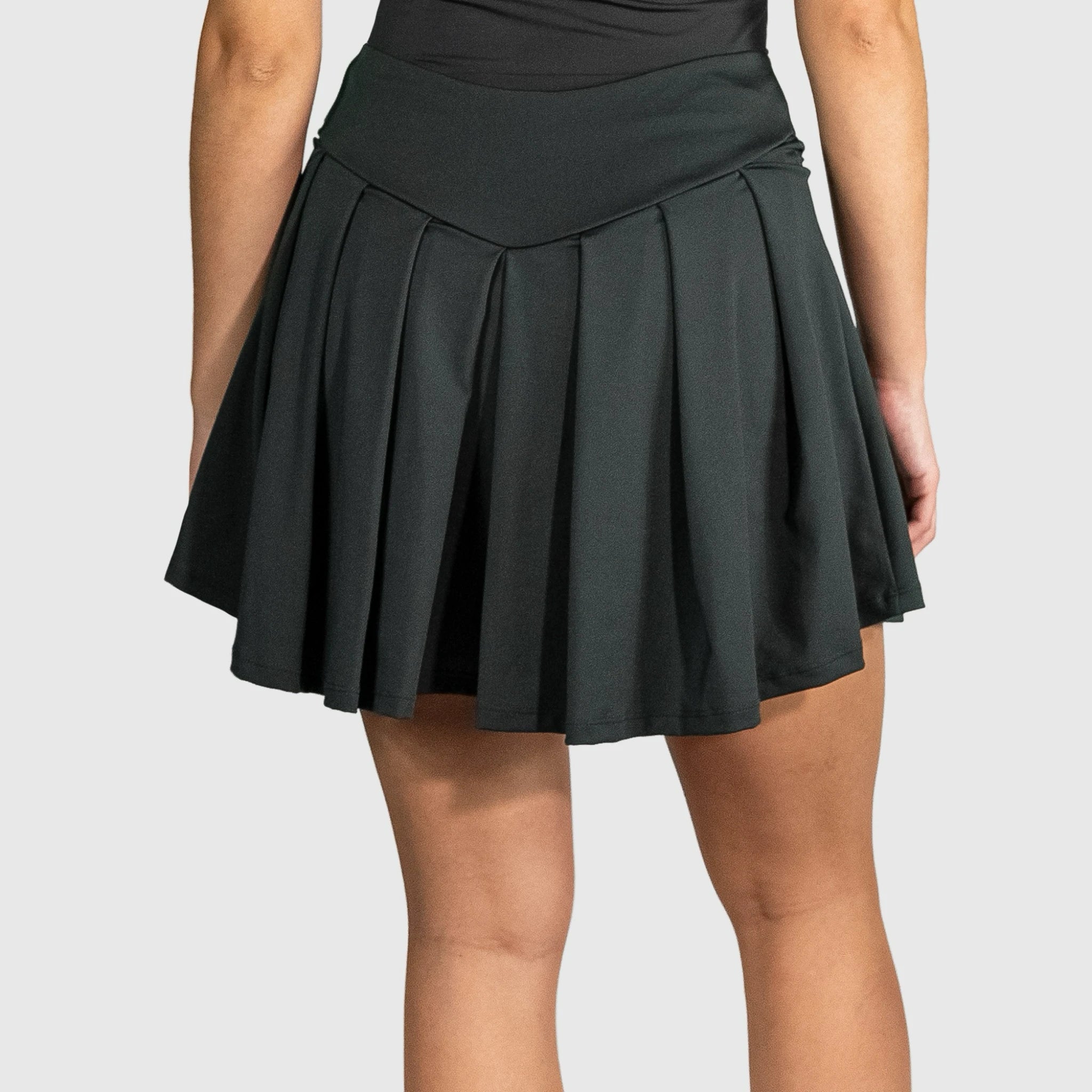 Squid Padel Skirt Grey worn by a person on a light gray background